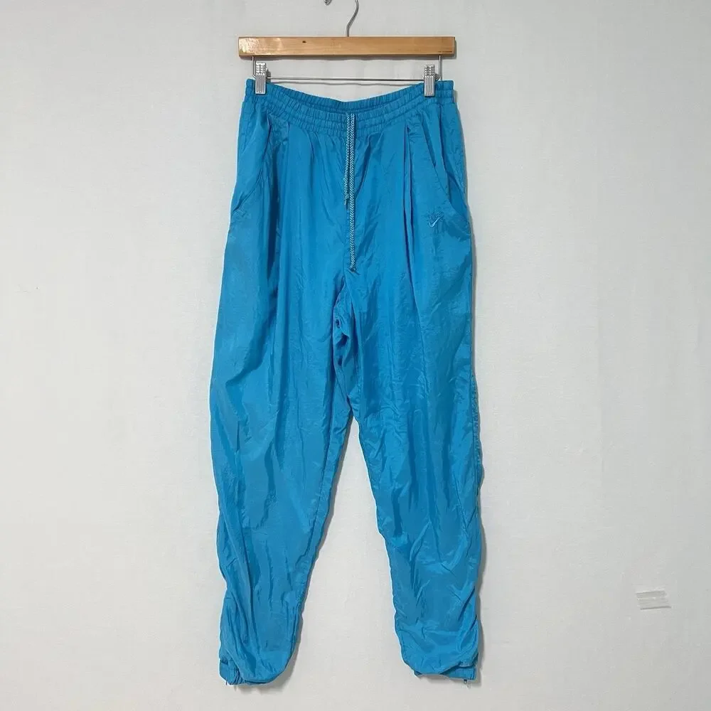 Vintage Nike Women’s Teal Nylon Windbreaker Track Pants Size L Lined 90’s